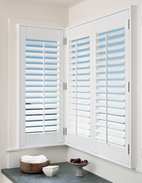 Palm Beach Polysatin Shutters cornerwindow kitchen detail